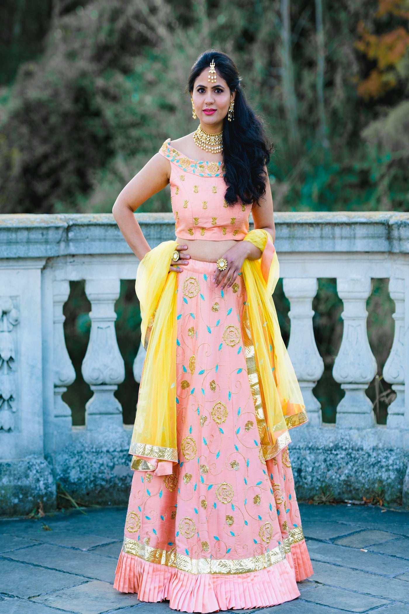 JUHI - Peach Embroidered Lehenga.